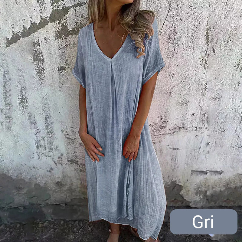 🔥 OFERTĂ LIMITATĂ! Rochie maxi lejeră, cu decupaj în V – elegantă și confortabilă. Livrare rapidă în România!
