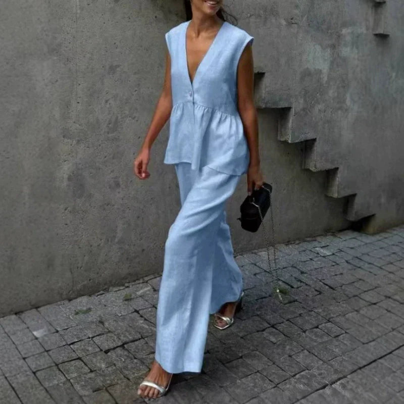 、👚 Set două piese: top fără mâneci, guler în V + pantaloni largi – stil lejer, elegant, perfect pentru vară. 🌸 Plată la livrare!