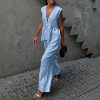 、👚 Set două piese: top fără mâneci, guler în V + pantaloni largi – stil lejer, elegant, perfect pentru vară. 🌸 Plată la livrare!