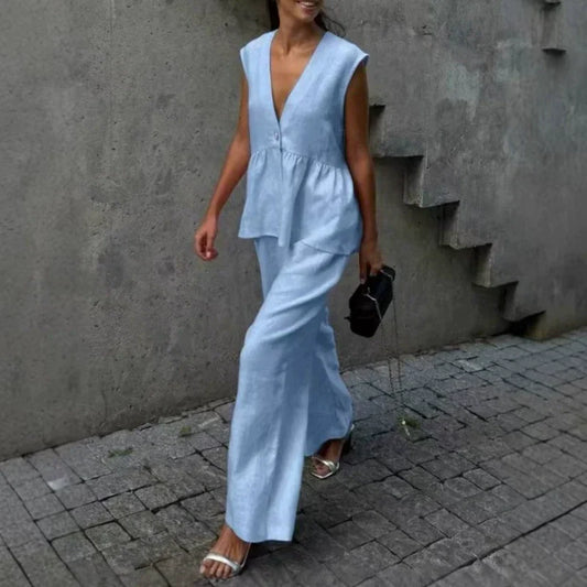 、👚 Set două piese: top fără mâneci, guler în V + pantaloni largi – stil lejer, elegant, perfect pentru vară. 🌸 Plată la livrare!