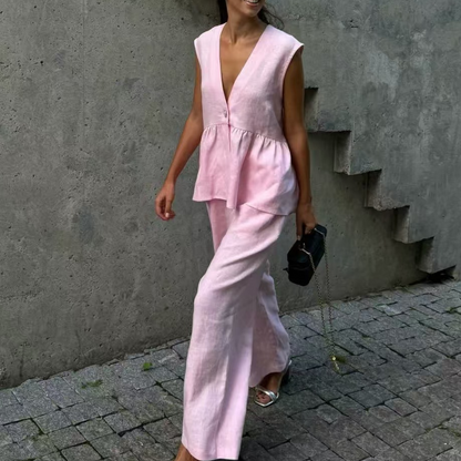 、👚 Set două piese: top fără mâneci, guler în V + pantaloni largi – stil lejer, elegant, perfect pentru vară. 🌸 Plată la livrare!