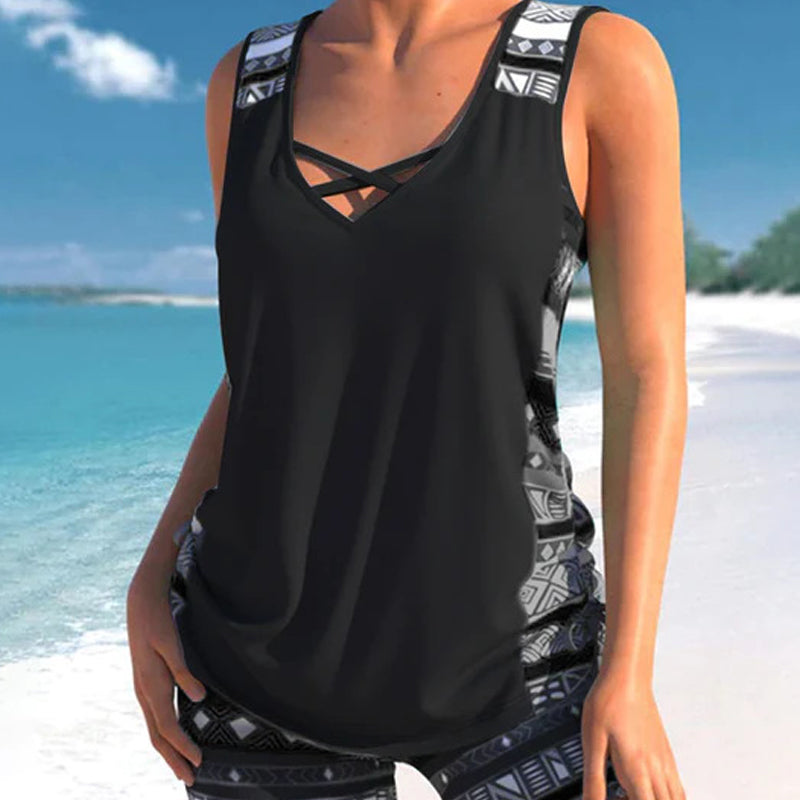🔥 Costumul de baie tankini care îți dă încredere! 🏊‍♀️ Imprimeu stylish, două piese – perfect pentru plajă sau piscină.