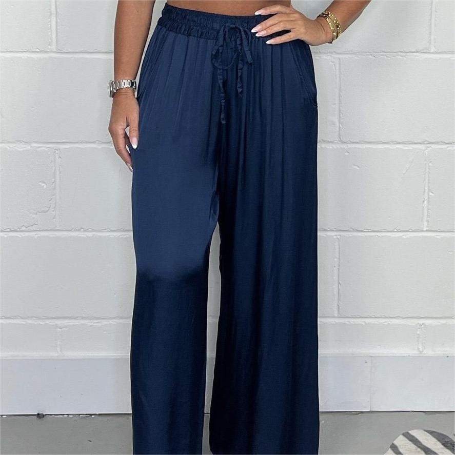 Pantaloni eleganti cu talie reglabilă, picior drept, netezi și largi, cu buzunare