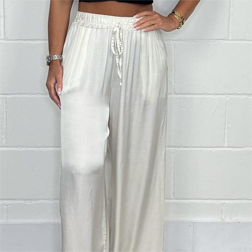 Pantaloni eleganti cu talie reglabilă, picior drept, netezi și largi, cu buzunare