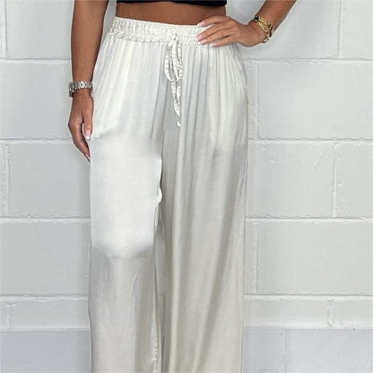 Pantaloni eleganti cu talie reglabilă, picior drept, netezi și largi, cu buzunare