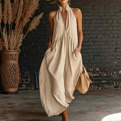 🔥 Rochia maxi care îți dă aer fresh! 🌬️ Guler halter + decolteu în V – perfectă pentru zilele caniculare.