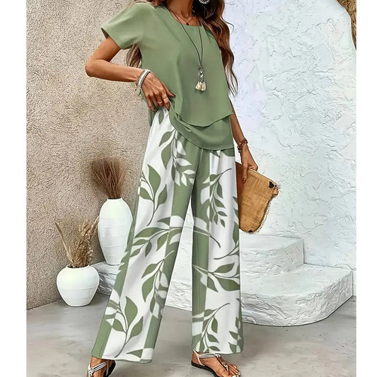 🌿 Set două piese femei – imprimeu frunze + pantaloni cu picior larg. Elegant, confortabil și perfect pentru vară! 🔥 Plătești DOAR la livrare în România. ✅ Comandă acum – stoc limitat!