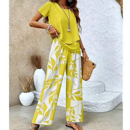 🌿 Set două piese femei – imprimeu frunze + pantaloni cu picior larg. Elegant, confortabil și perfect pentru vară! 🔥 Plătești DOAR la livrare în România. ✅ Comandă acum – stoc limitat!